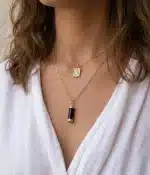 Black Goldplated Milestone necklace on Female model