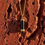 Milestone necklace black stone goldplated in the sunset